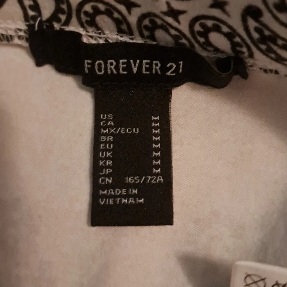 *3 for $15* Forever 21 Mini Patterned Skirt - Picture 2 of 3
